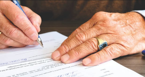 lawyer signing an agreement