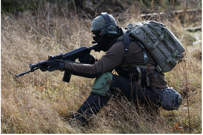 a soldier with a riffle